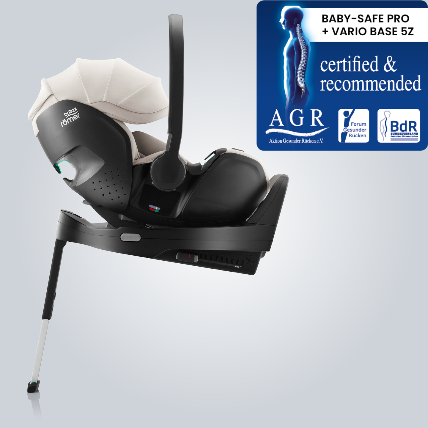 BABY-SAFE PRO infant carrier in Soft Taupe, mounted on an ISOFIX base with support leg, shown in side view with the Aktion Gesunder R&uuml;cken e.V. &ldquo;Tested & Recommended&rdquo; badge.