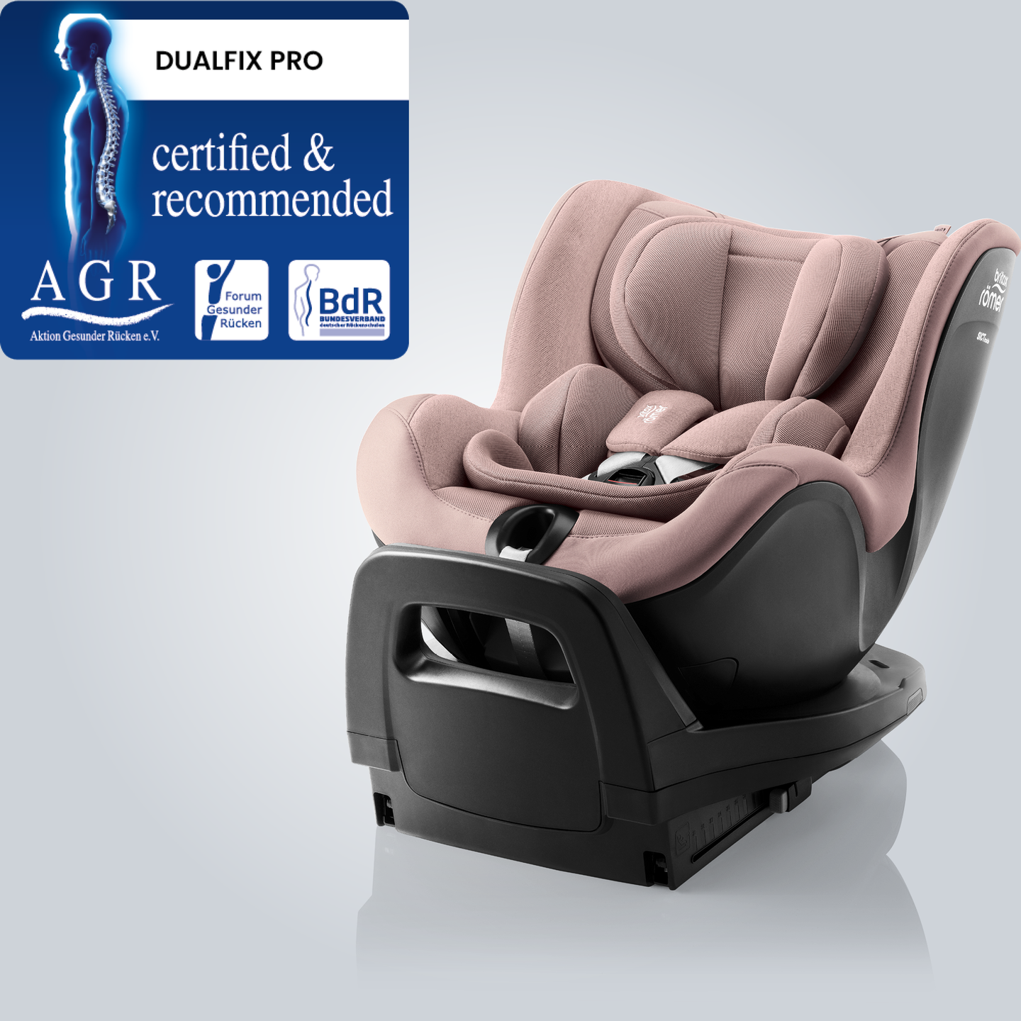 DUALFIX PRO in Dusty Rose, a 360&deg; rotating baby car seat with deep side wings and integrated base, shown in an angled front view with the Aktion Gesunder R&uuml;cken e.V. &ldquo;Tested & Recommended&rdquo; badge.